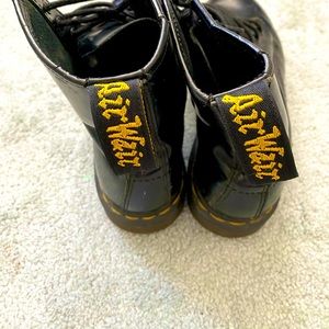 Black Doc Marten lace-up boots